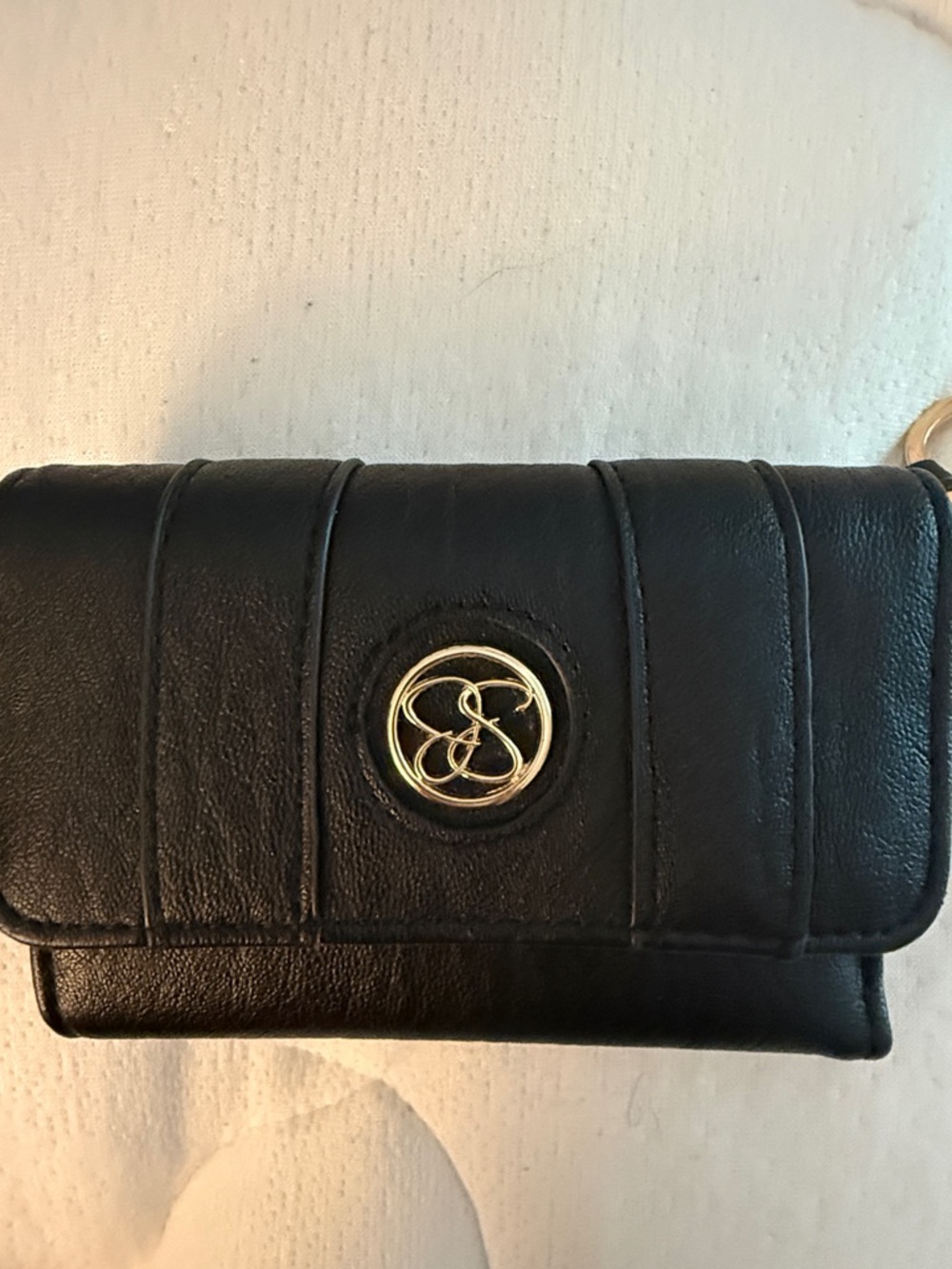 Black Women's Leather Crossbody Wallet with Gold Emblem